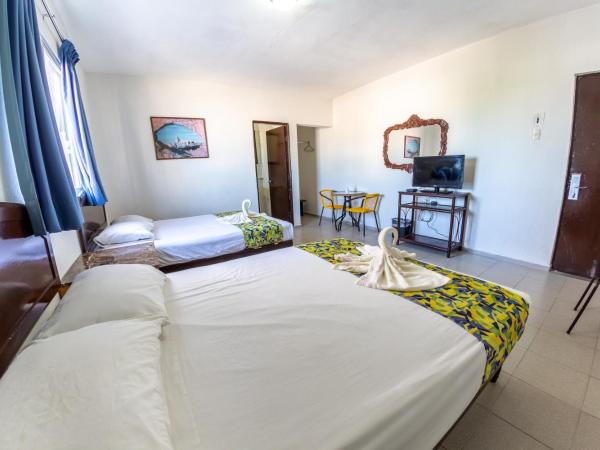 Hotel Isla de Sacrificio : photo 1 de la chambre chambre double standard avec 2 lits doubles