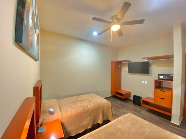 La Lola Hotel & Suites : photo 1 de la chambre chambre double