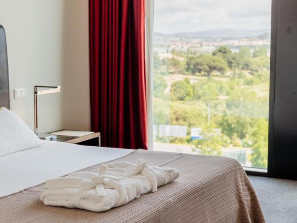 Axis Viana Business & SPA Hotel : photo 5 de la chambre chambre double ou lits jumeaux (2 adultes + 1 enfant)