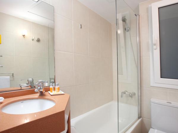 Aparthotel Silver : photo 9 de la chambre chambre double ou lits jumeaux standard - vue sur jardin