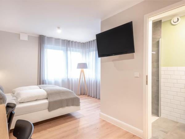 The Woodmans Airport Boardinghouse : photo 5 de la chambre appartement