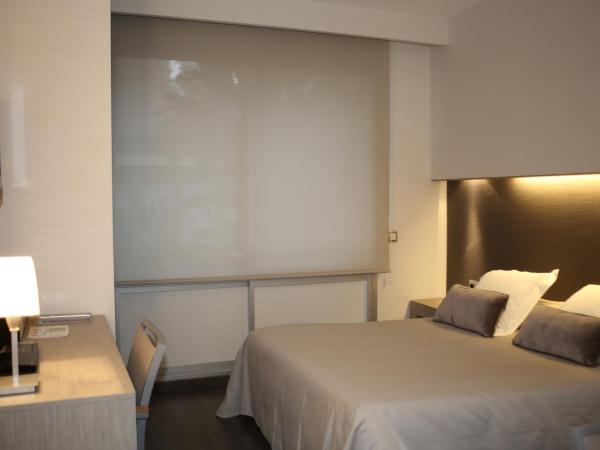 Aparthotel Silver : photo 10 de la chambre chambre double ou lits jumeaux standard - vue sur jardin