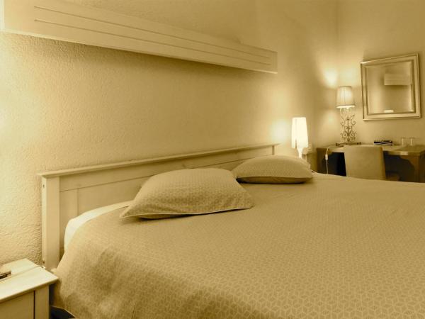 Hotel Les Arcades : photo 1 de la chambre chambre double supérieure