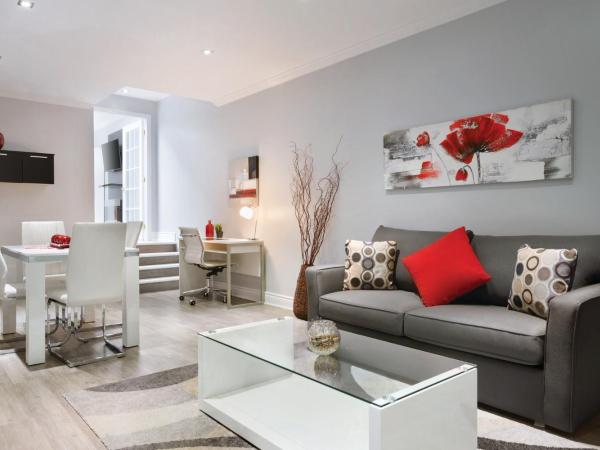 Travelodge by Wyndham Quebec City Hotel & Convention Centre : photo 1 de la chambre suite prestige avec lit king-size - non-fumeurs