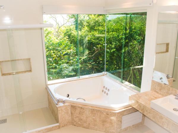 Pousada Praia João Fernandes : photo 3 de la chambre suite avec jacuzzi