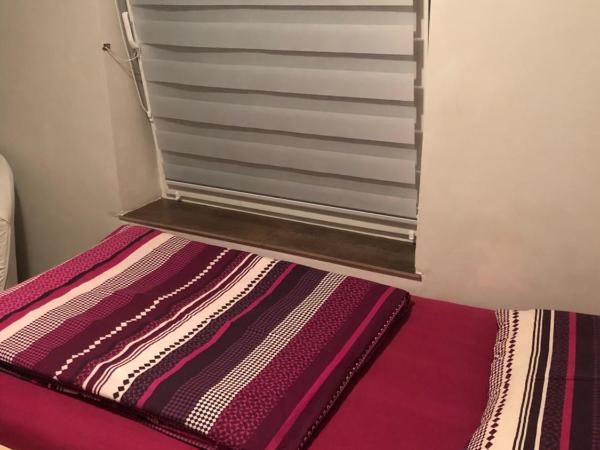 Tanie Pokoje Blisko Lotniska : photo 2 de la chambre petite chambre simple