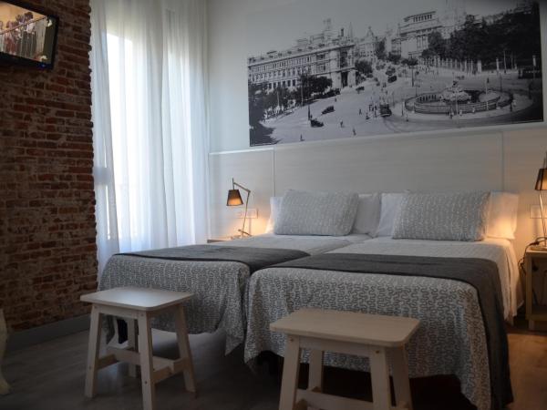 Hostal San Lorenzo : photo 7 de la chambre chambre quadruple (4 adultes)