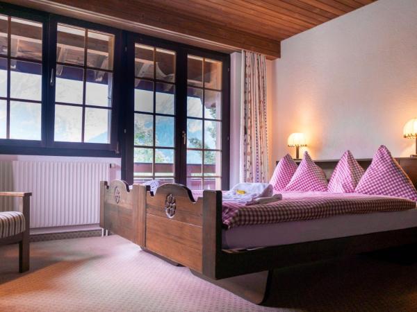 Hotel Gletscherblick Grindelwald : photo 1 de la chambre chambre lits jumeaux standard