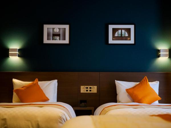 Best Western Plus Fukuoka Tenjin-minami : photo 6 de la chambre quadruple room with four single beds