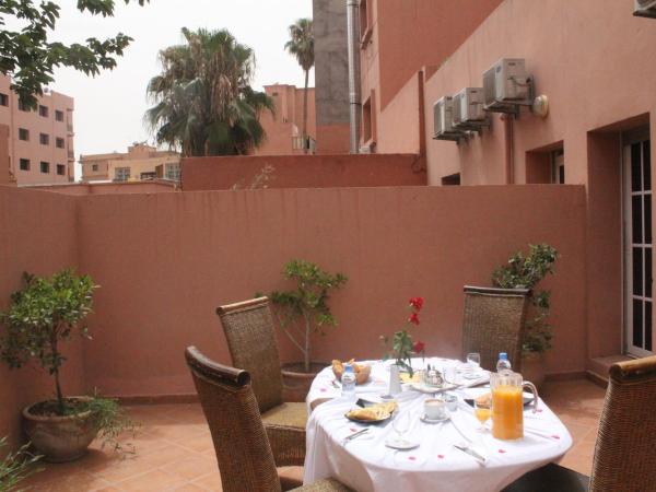 Rooms Palace Appart-Hôtel : photo 1 de la chambre appartement avec balcon