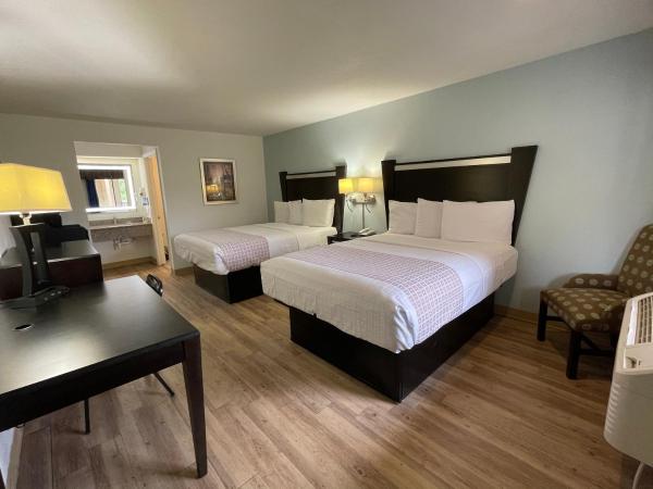 Tricove Inn & Suites : photo 3 de la chambre chambre avec 2 grands lits queen-size 