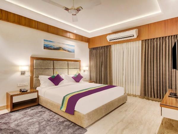 Treebo Premium Tahoora International : photo 1 de la chambre [sanitized] standard double room