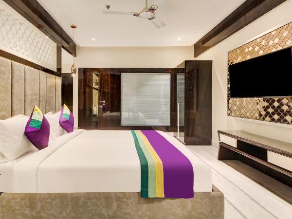 Treebo Premium Tahoora International : photo 6 de la chambre chambre double supérieure [assainie]