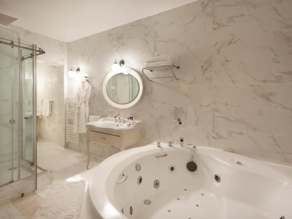 Villa Levante : photo 5 de la chambre suite jardin avec bain à remous