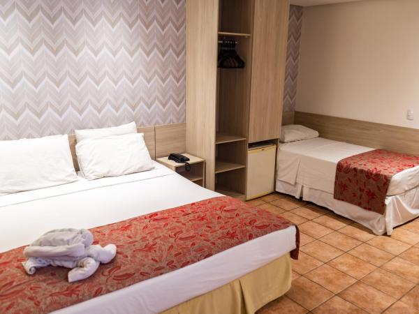 Plaza Praia Suítes : photo 3 de la chambre chambre triple de luxe