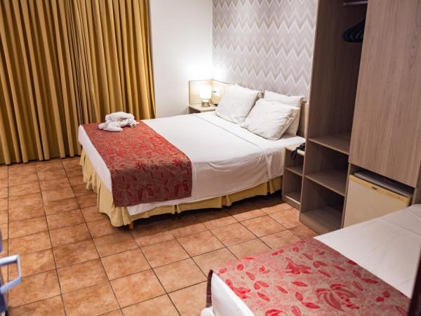 Plaza Praia Suítes : photo 5 de la chambre chambre triple de luxe