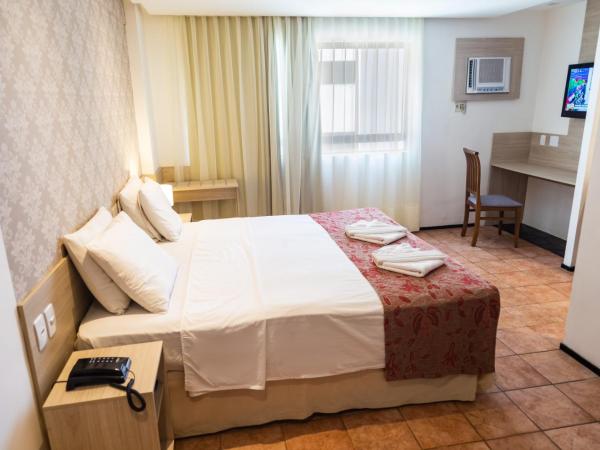 Plaza Praia Suítes : photo 8 de la chambre chambre deluxe