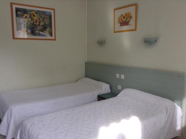 Hôtel Du Stade : photo 3 de la chambre chambre lits jumeaux