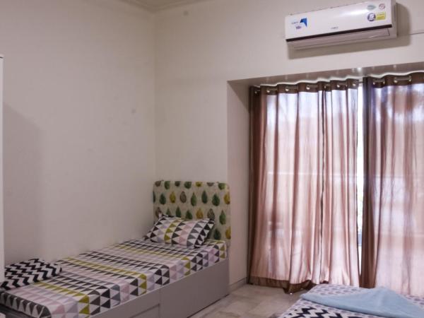Urban Nomads Pune Riverside CoLive CoWork : photo 9 de la chambre 4 sharing ac mixed room
