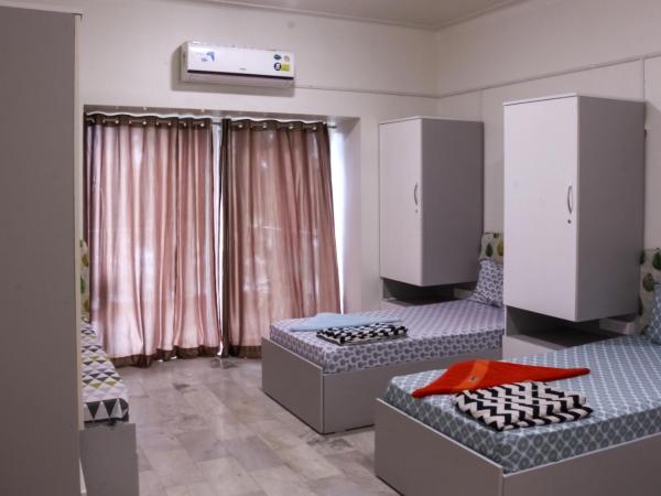 Urban Nomads Pune Riverside CoLive CoWork : photo 8 de la chambre 4 sharing ac mixed room