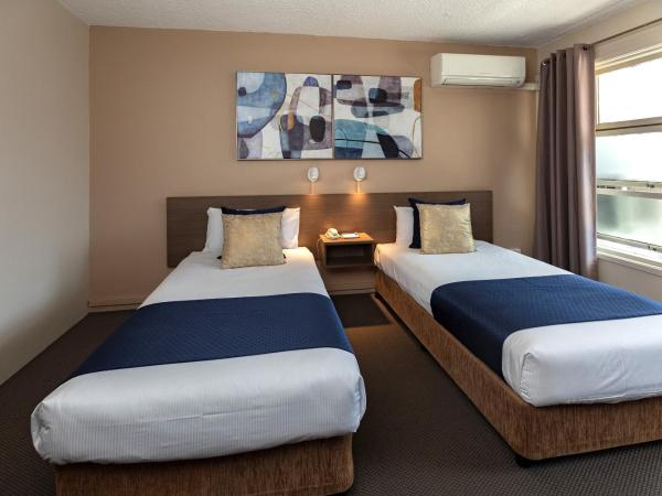 The Metropolitan Spring Hill : photo 2 de la chambre hébergement lits jumeaux metro