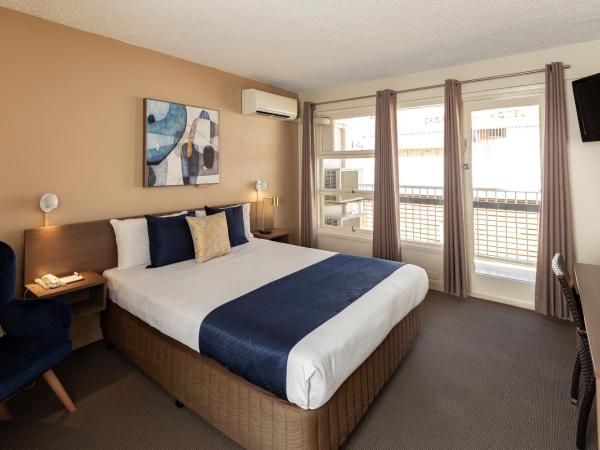 The Metropolitan Spring Hill : photo 1 de la chambre hébergement lit queen-size metro