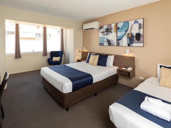 The Metropolitan Spring Hill : photo 1 de la chambre hébergement triple metro