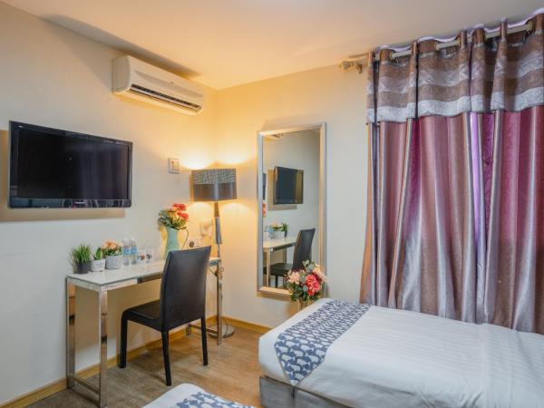 Euro Rich Hotel Melaka : photo 2 de la chambre chambre lits jumeaux deluxe