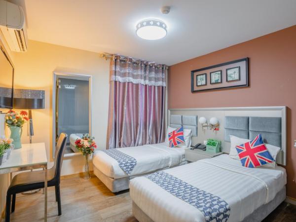 Euro Rich Hotel Melaka : photo 1 de la chambre chambre lits jumeaux deluxe