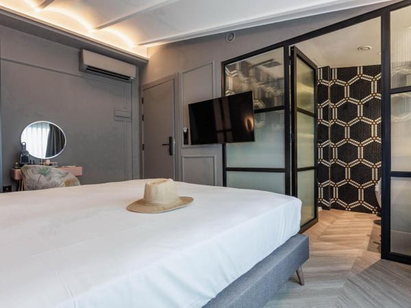 Reina 107 Beach Boutique : photo 1 de la chambre chambre double avec terrasse