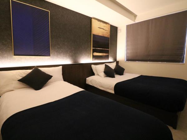 TAKETO STAY Kotoni : photo 2 de la chambre appartement avec douche