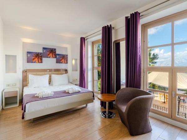 Puding Hotel : photo 9 de la chambre chambre double standard - vue latérale sur mer