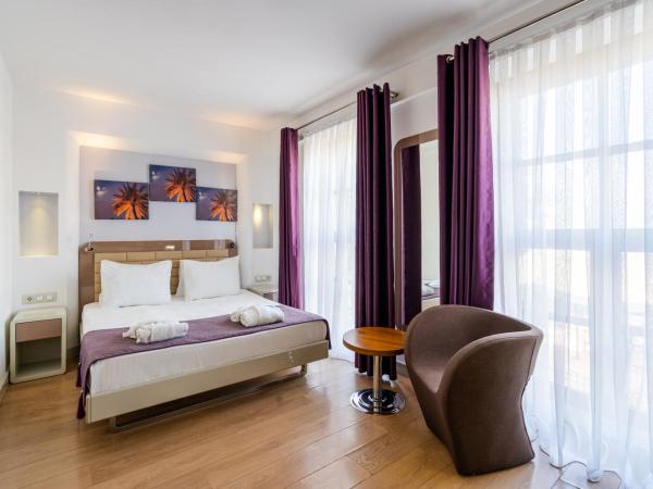 Puding Hotel : photo 10 de la chambre chambre double standard - vue latérale sur mer