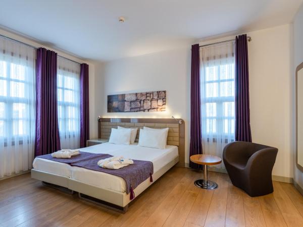 Puding Hotel : photo 1 de la chambre chambre familiale