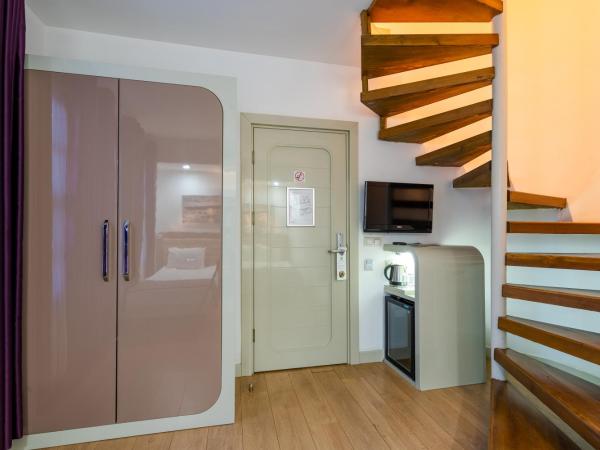 Puding Hotel : photo 6 de la chambre chambre familiale