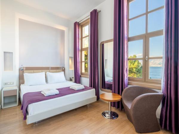 Puding Hotel : photo 2 de la chambre chambre double standard - vue latérale sur mer