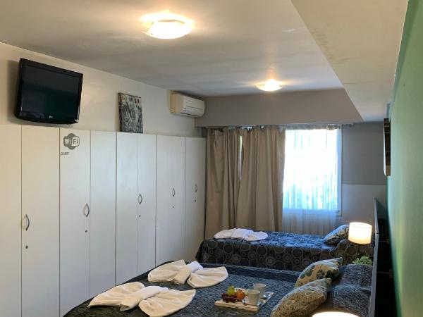 Novum Suites : photo 4 de la chambre chambre triple