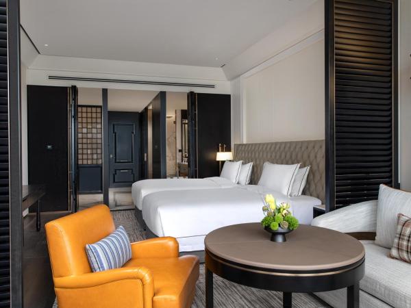 Suning Zhongshan Golf Resort : photo 1 de la chambre garden view twin bed room with balcony