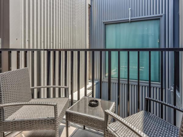 Meridian Hotel Hurstville : photo 1 de la chambre chambre lit king-size - accessible aux personnes à mobilité réduite