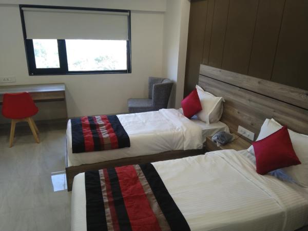 HOTEL INDUS INN : photo 10 de la chambre chambre simple deluxe