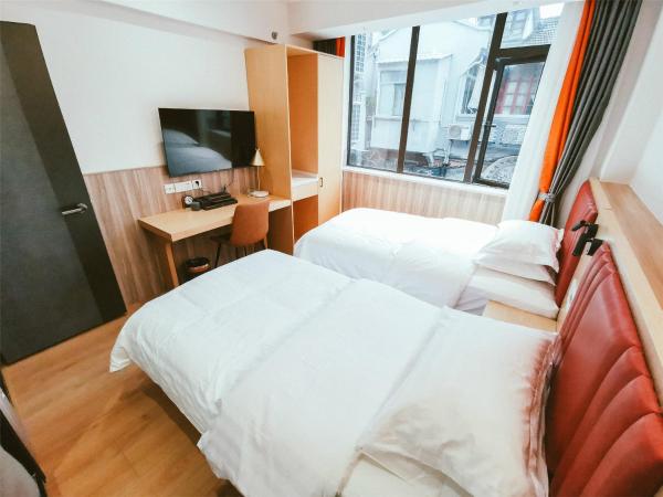 Shanghai Fish Inn People Square : photo 3 de la chambre chambre lits jumeaux deluxe