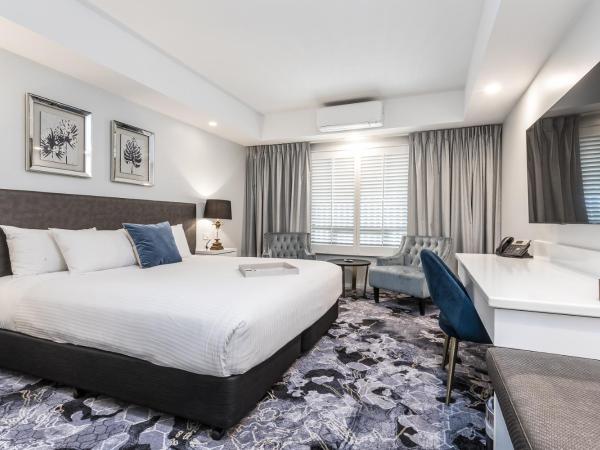 Kingsford Smith Motel : photo 4 de la chambre chambre de luxe récemment rénovée lit king-size