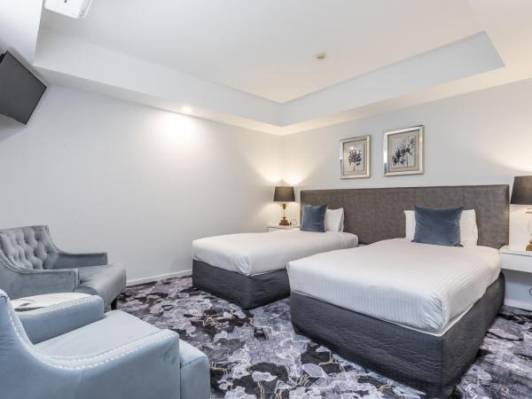 Kingsford Smith Motel : photo 1 de la chambre chambre lits jumeaux