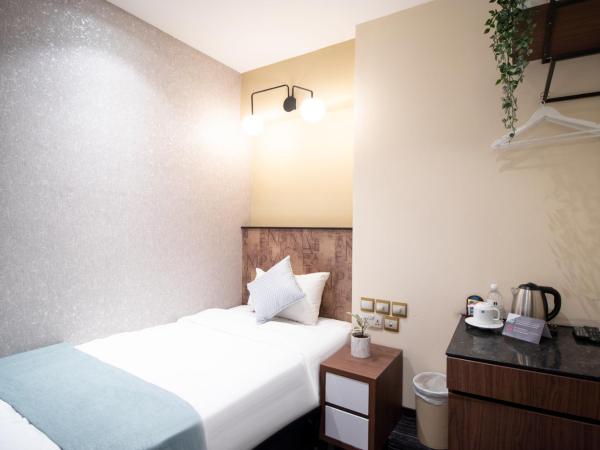 Harbour Ville Hotel - Hamilton : photo 5 de la chambre deluxe single without window