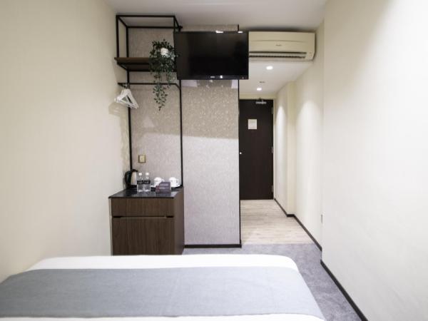 Harbour Ville Hotel - Hamilton : photo 3 de la chambre deluxe queen without window