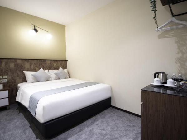 Harbour Ville Hotel - Hamilton : photo 1 de la chambre deluxe queen without window