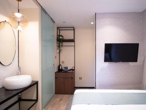 Harbour Ville Hotel - Hamilton : photo 5 de la chambre deluxe queen with window