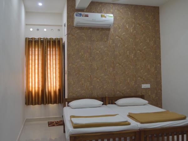 Coral Homes : photo 4 de la chambre chambre lits jumeaux deluxe