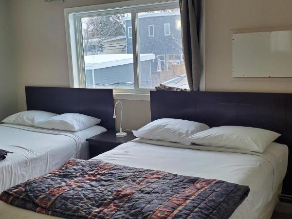 BUDGET LODGE : photo 2 de la chambre chambre double avec lit d'appoint