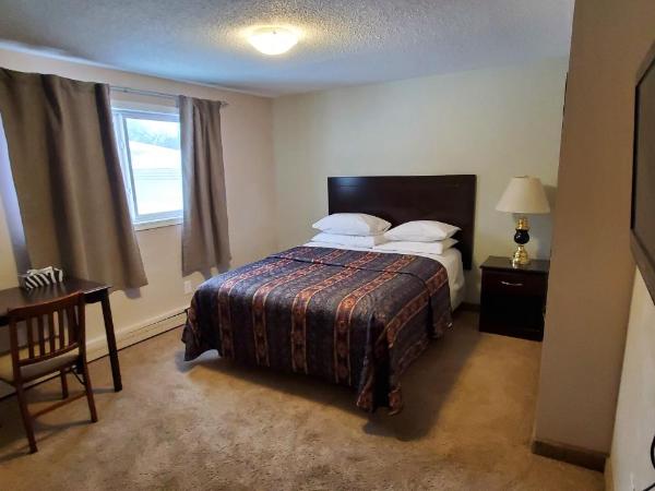 BUDGET LODGE : photo 5 de la chambre chambre lit queen-size deluxe